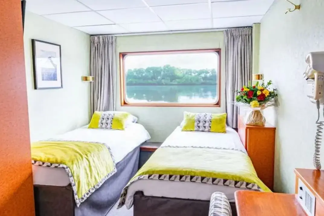 MAIN DECK 2 ADJUSTABLE TWIN BEDS.webp